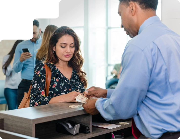 Two businesswomen looking at a tablet